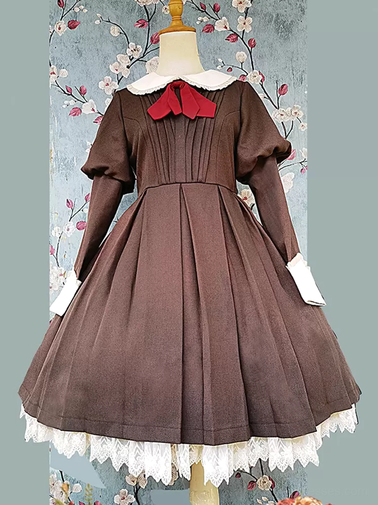 Front view of classic long-sleeve lolita dress highlighting the pleated bodice, white lace accents, and structured silhouette that defines authentic lolita fashion