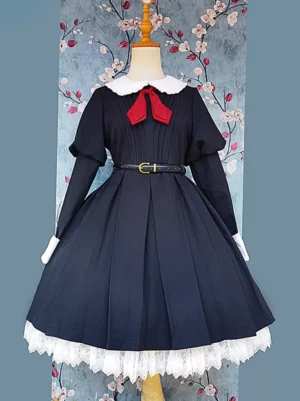 Full front view of classic long-sleeve black lolita dress with structured pleated bodice, white lace trim, red bow accent, and gold buckle waist belt on dress form