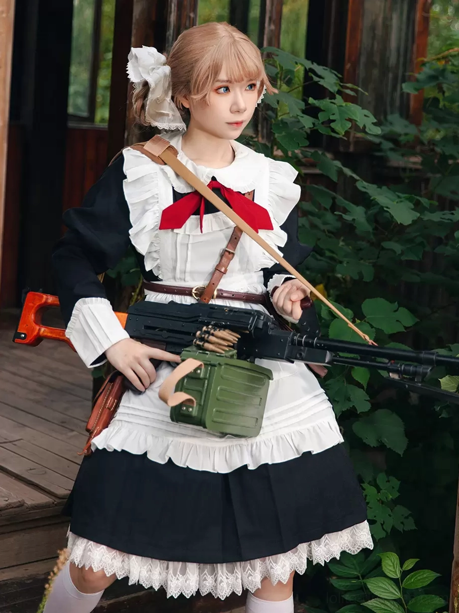 Maid-inspired variant style of classic lolita dress worn by model outdoors with apron front design, lace skirt hem, and authentic lolita aesthetic