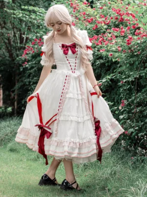 Classic lolita dress with layered ruffled skirt and wine red ribbon details low angle front side view