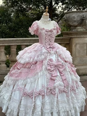 Classic Lolita dress with square neckline, pink satin bow, layered ruffle skirt, delicate lace accents, and romantic silhouette - front facing