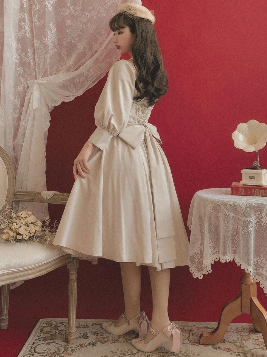 Classic lolita ecru dress side back angle showing shirred back design waist bow midi-length swing skirt vintage style