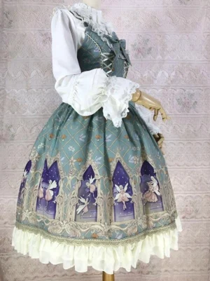 Sage green sleeveless lolita dress side three-quarter view showing flounced white blouse layered under jumper with cream ruffled skirt hem