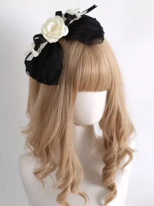 Classic Lolita KC hair hoop headdress left side view on mannequin with light golden curly wig, featuring black mesh bow, cream fabric rose, and delicate sheer ribbon accents