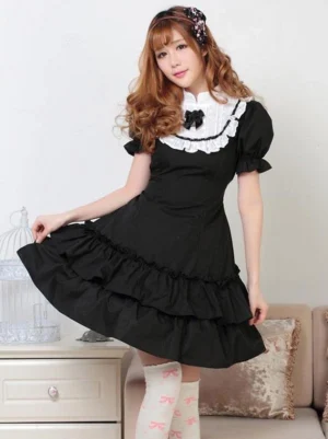 Lolita one-piece dress side view showing fitted waist and multi-tier ruffled skirt silhouette with lace-trimmed collar detail