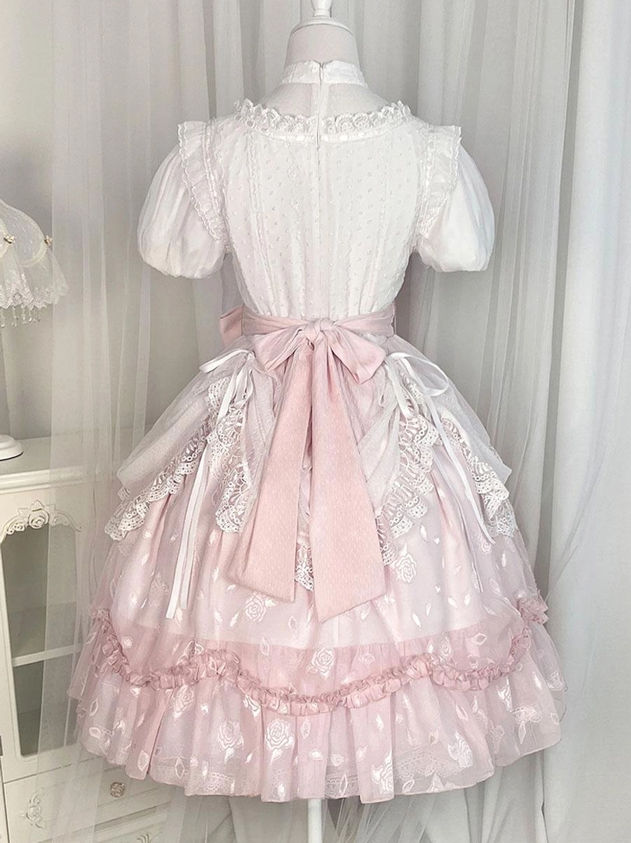 Pink classical lolita dress back full view indoor studio puff short sleeves large waist bow lace trim details