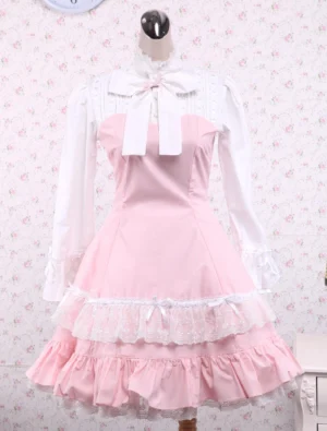 Classic pink and white lace cotton lolita dress full front view showing high collar with decorative bow, white long sleeves with ruffled cuffs, and layered lace-trimmed skirt hem displayed on dress form
