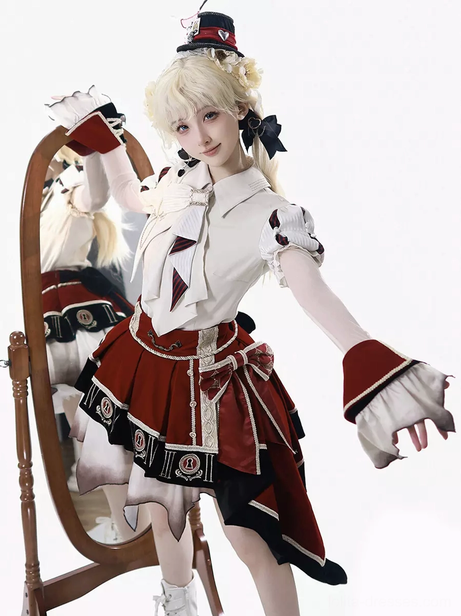 Lolita performance suit displaying short puffy sleeves with ruffled wrist cuffs and twin hair bows, side three-quarter view in white studio