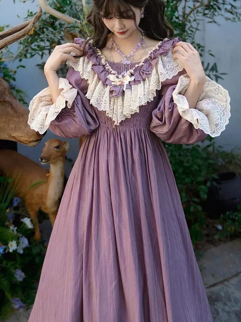Classic lolita purple dress front three-quarter angle showing lace-trimmed cuffs and refined collar detail