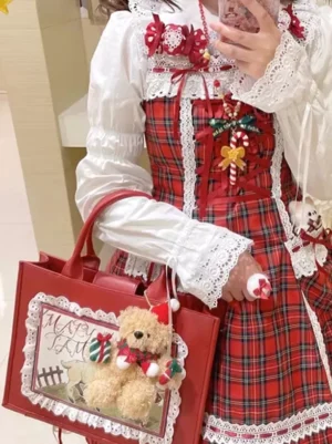 classic lolita red handbag side close-up with Christmas teddy bear ornament charm on red plaid dress coordinate