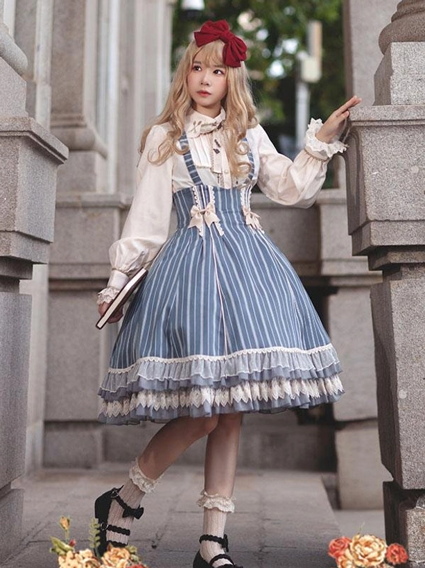 Sleeveless striped classic lolita jumper dress side view, showing lace-trimmed hem, halter straps, and coordinated styling
