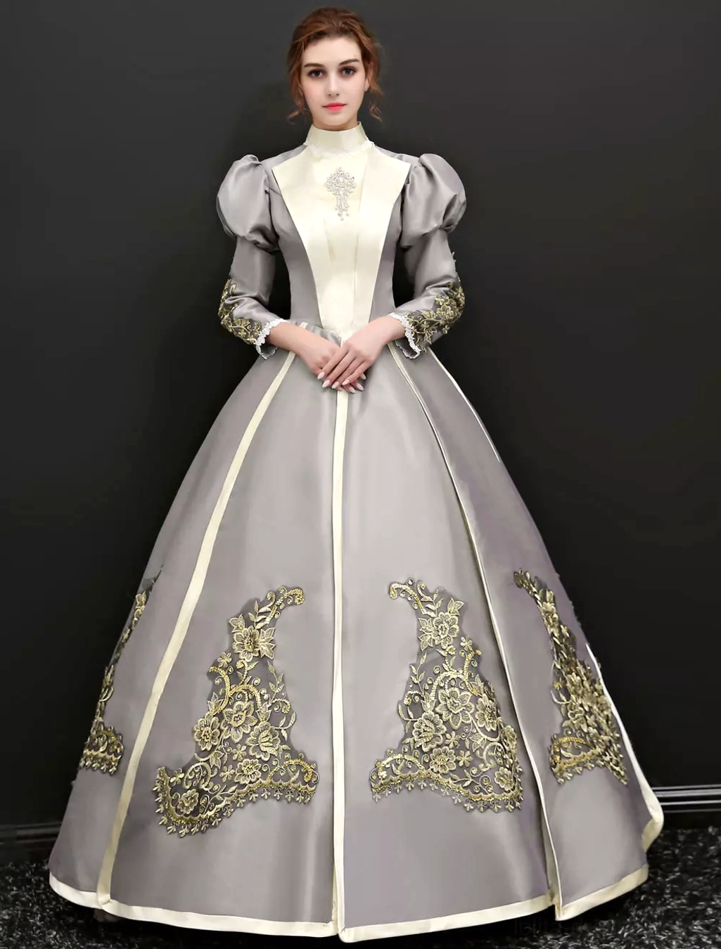 Classic Lolita Victorian grey ball gown with gold floral embroidery and cream color blocking, front full-body view on model with stand collar and puffed sleeves
