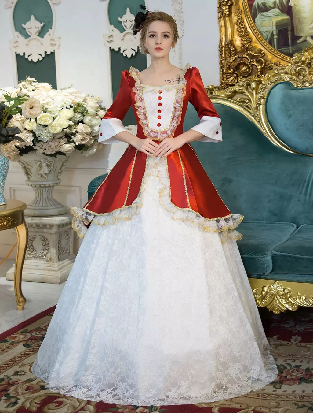 Classic Lolita Victorian maid dress with red satin bodice and white lace floor-length skirt, featuring square neckline and bell sleeves, front view on female model in palace setting with gold trim accents