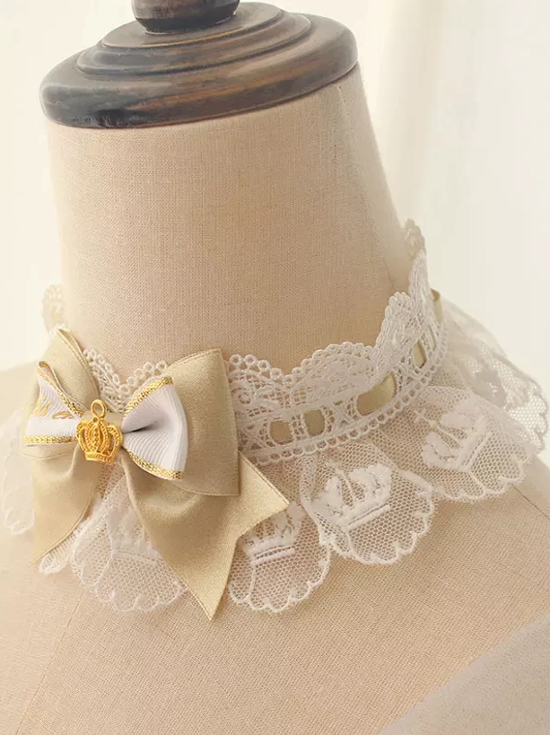 Classic lolita white lace choker with embroidered crown detail and champagne gold bow accent front view