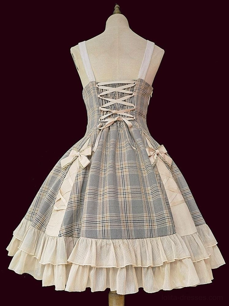 Lolita JSK dress back full view on dress form showing lace-up back closure, decorative waist bows, and camel plaid pattern construction