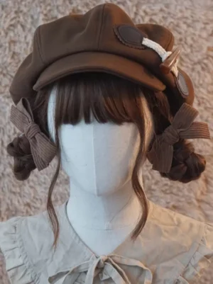 Coffee brown Sweet Lolita newsboy cap front view on faceless mannequin with twin braids, featuring toggle buckle and ribbon bow ornaments against fluffy fleece background