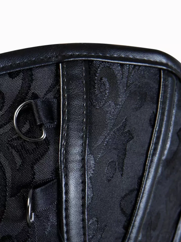 Corset side panel detail showing black leather trim jacquard fabric and metal D-ring fasteners gothic style