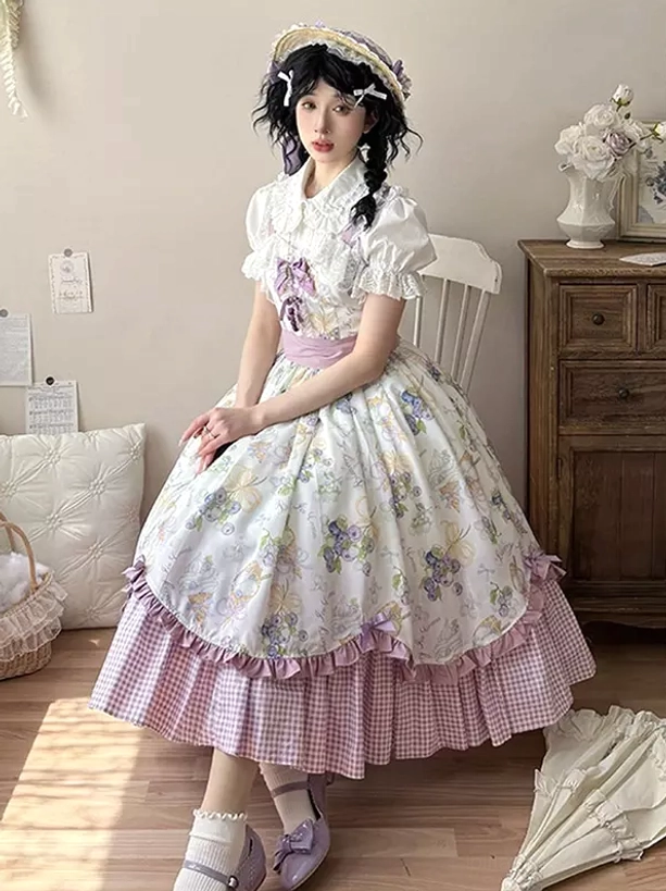 Country lolita OP dress sitting side view black twin braids peter pan collar purple gingham puffy short sleeves