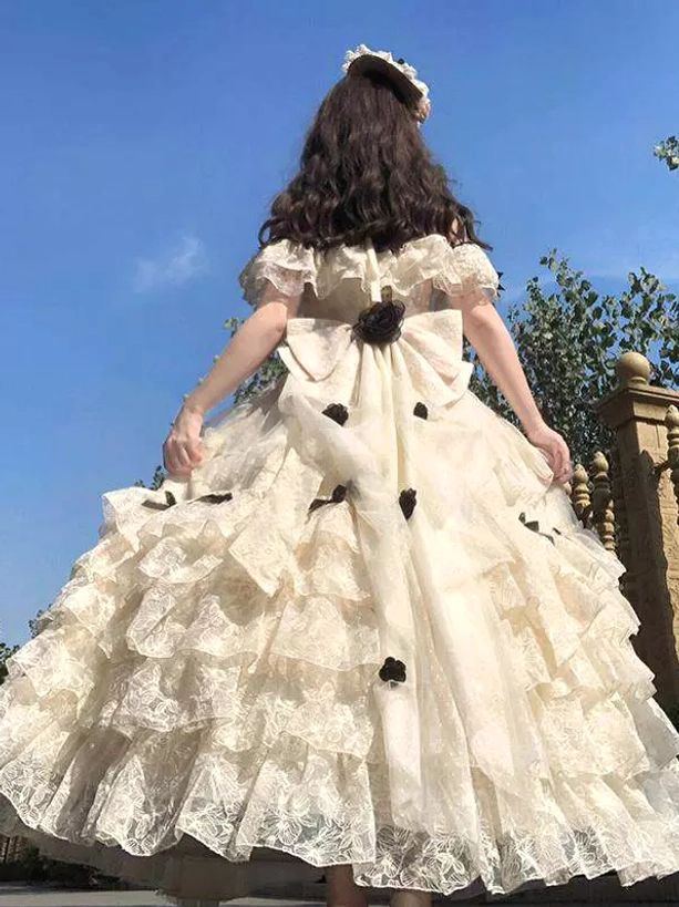 cream off-shoulder fairy lolita wedding ball gown back view large back bow small black bows short sleeves full silhouette