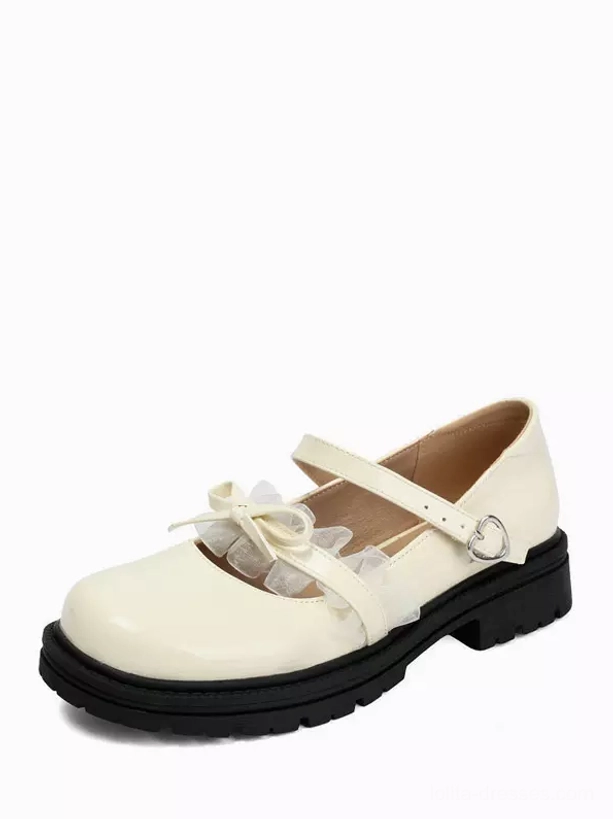 Single cream lolita mary jane shoe static display side view on white background, featuring patent leather ruffle bow and black chunky sole