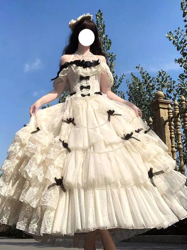 cream cake tiered lace fairy lolita wedding gown multi-layer skirt with black bow details full body side view outdoor european yard