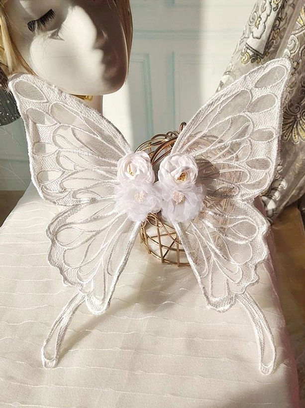 Off-white cream lace butterfly hair accessory on mannequin head with sheer lace wings white flower decoration - vintage sweet lolita headwear pale variant