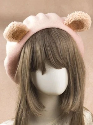 Soft pink bear ear wool lolita beret headdress displayed from front three-quarter perspective, showcasing light pink fluffy ears with tan inner ear accents and elegant beret construction