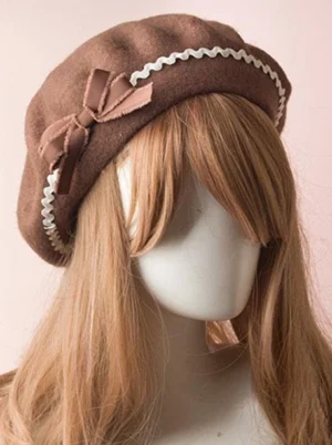 Dark brown Lolita beret with white ricrac trim and coordinating bow detail front three-quarter perspective
