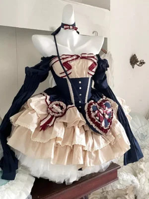 Dark navy and cream ballet sweet lolita dress with detachable sleeves displayed on mannequin, featuring corset bodice, tiered ruffled skirt, and matching heart-shaped bag studio front view