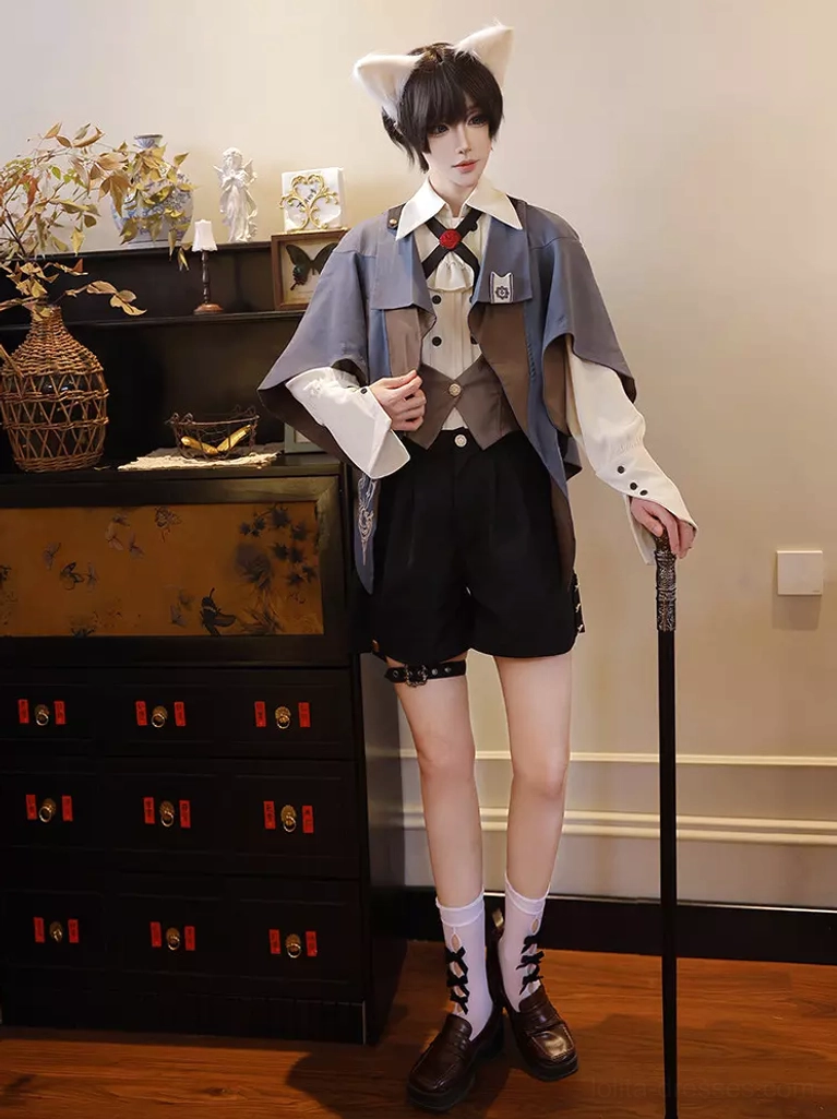 Dark navy ouji lolita gentleman suit showing complete Cape details with grommets and decorative embroidered elements