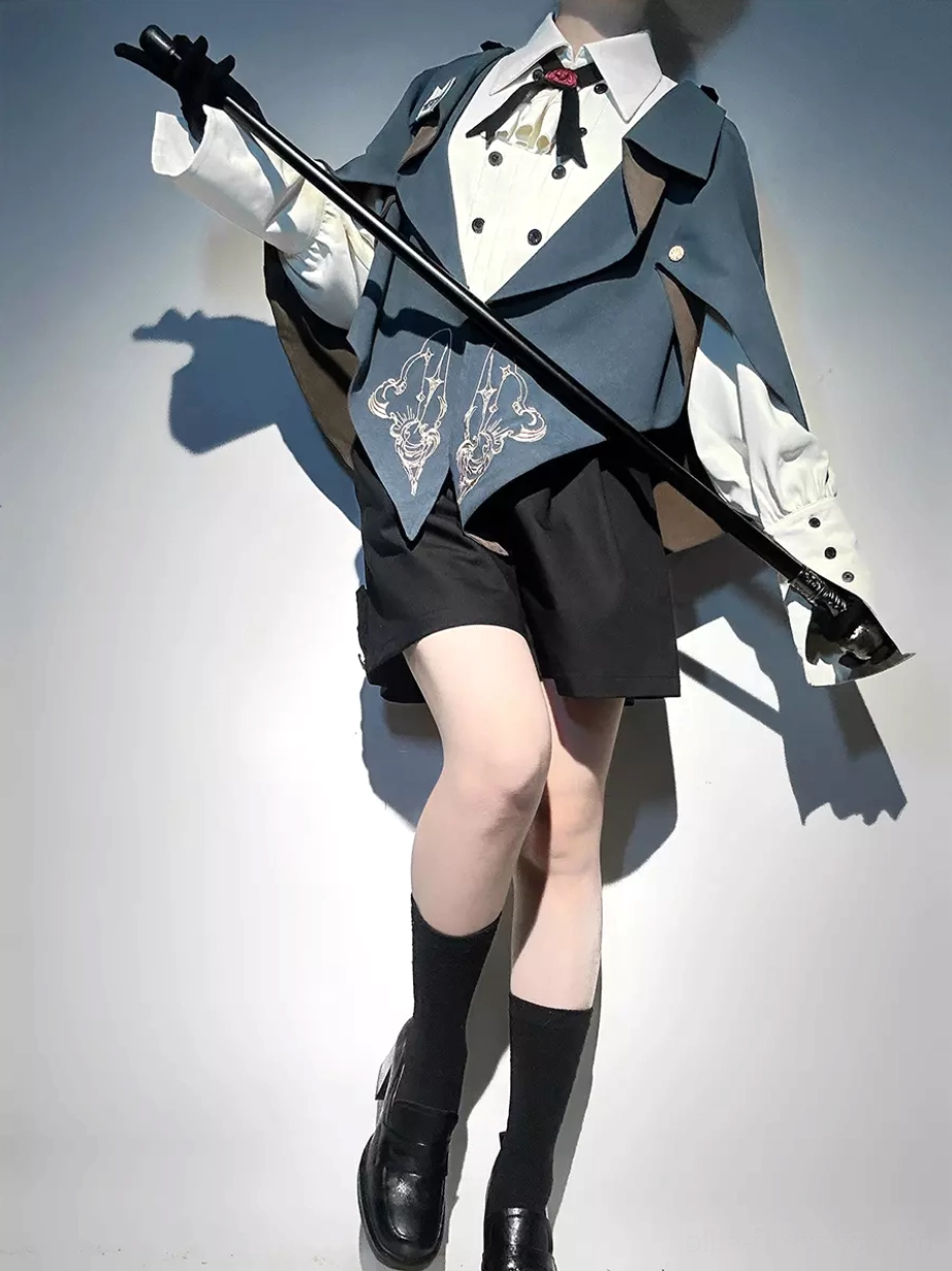 Dark navy ouji lolita gentleman suit set with asymmetrical cape and embroidered coat - low angle side view showing complete formal ensemble