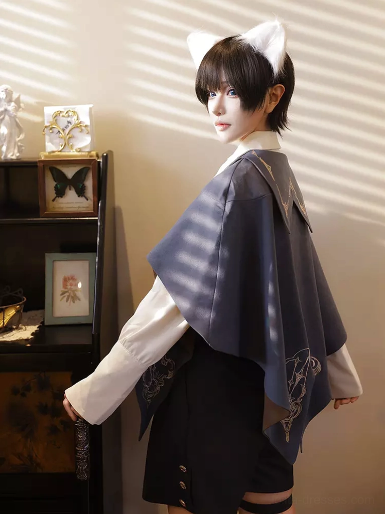 Dark navy ouji lolita suit showing necktie and cravat formal accessories with structured shirt and waistcoat layering