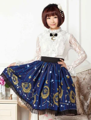 Deep blue sweet lolita skirt with celestial star and moon print, front three-quarter view on model with brown bob hair, black lace hem trim detail