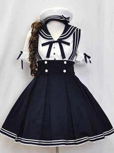 Deep blue sailor lolita two-piece outfit on mannequin front view featuring white sailor collar blouse with ruffled short sleeves and navy pleated jumper skirt with suspenders