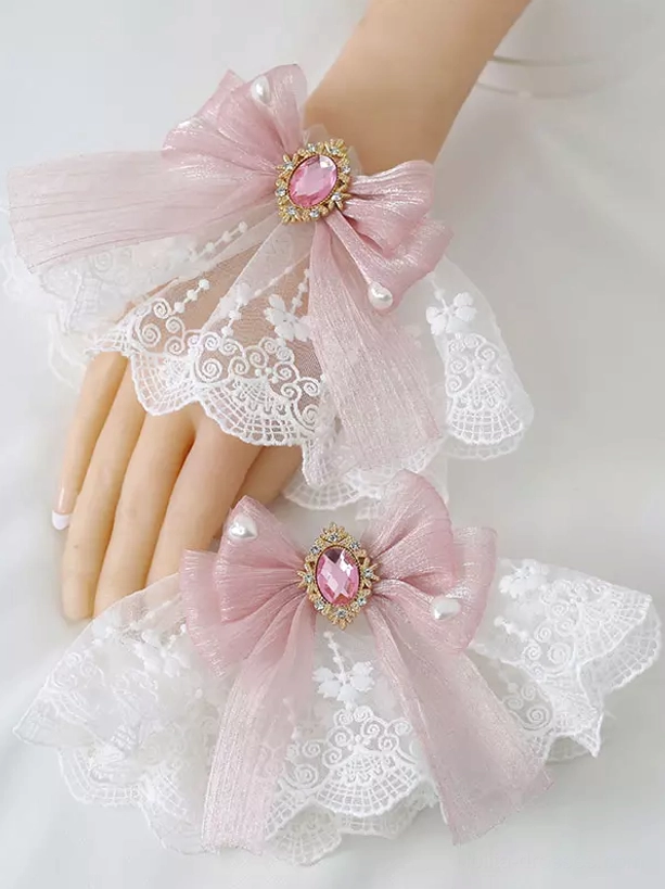 Deep pink organza wrist bow lolita accessory with pink gemstone in gold frame and pearl-detailed ruffled lace cuff