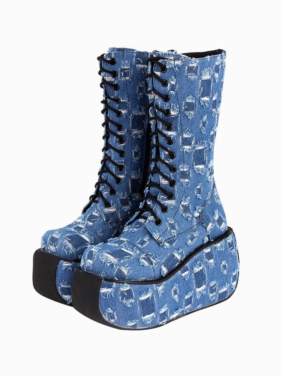 pair of distressed denim platform gothic boots right three-quarter view showing vintage worn texture and thick platform soles