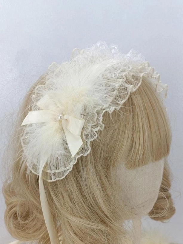 Ecru white feathered Lolita headdress with satin bow and pearl accents worn on blonde bob wig mannequin, showing side profile view of complete sweet Lolita hairband design with ruffled lace trim and delicate embellishments