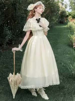 Ecru white sweet lolita fairy dress with decorative black bow and lace details, three-quarter front view with vintage parasol, garden photoshoot