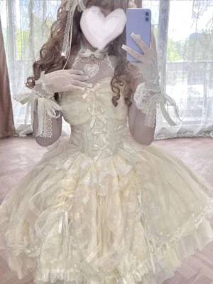 Ecru white Sweet Lolita JSK dress front view with lace gloves heart choker and ruffled tulle hem