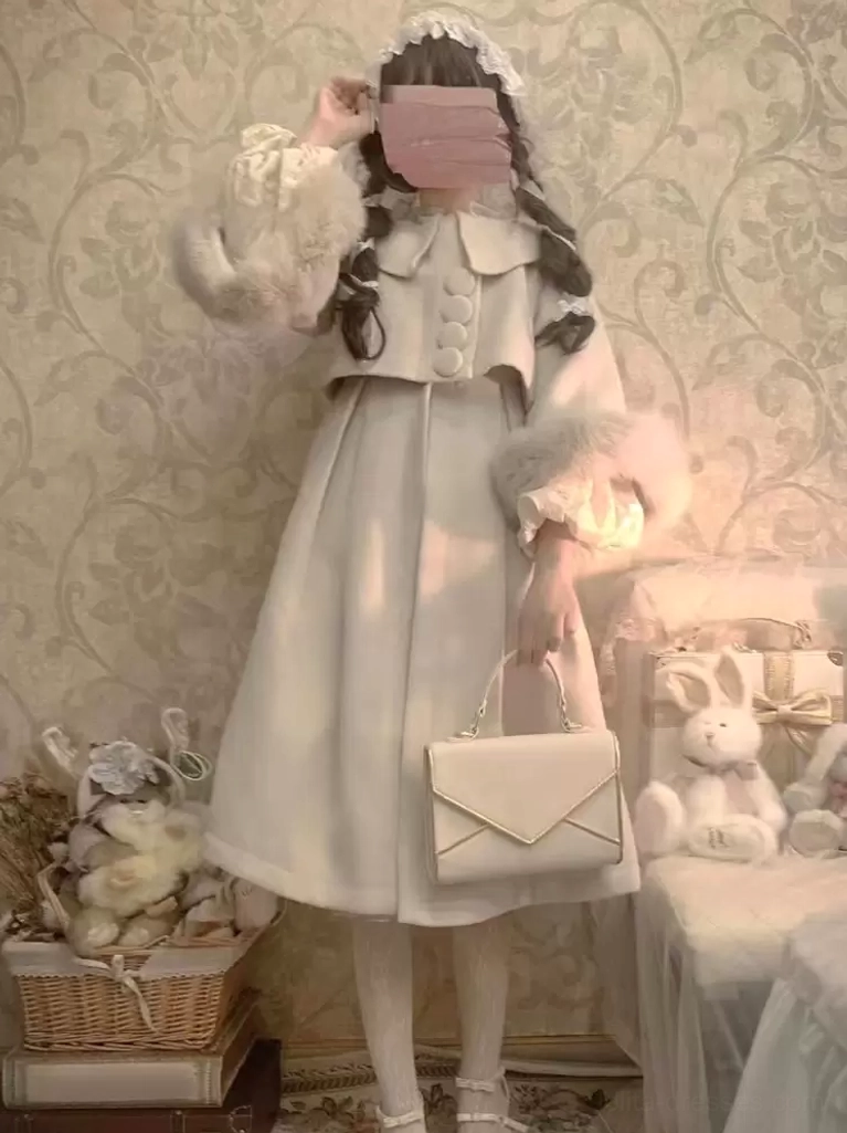 Ecru white sweet lolita wool overcoat with prominent doll collar, round decorative buttons, and fluffy white fur cuffs, full front body view on masked lolita model in vintage studio setting, showcasing ethereal angelic aesthetic