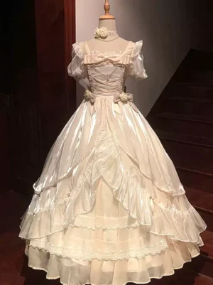 Enchanted garden fairy lolita dress ivory tulle organza full front view stairway display puff short sleeves multi-layered ruffled skirt rose bow decorations