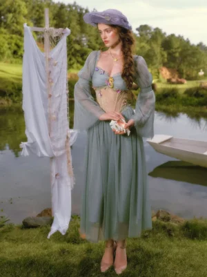 Enchanted teal fairy renaissance tulle midi dress with corset bodice and 3D floral details full body view lakeside