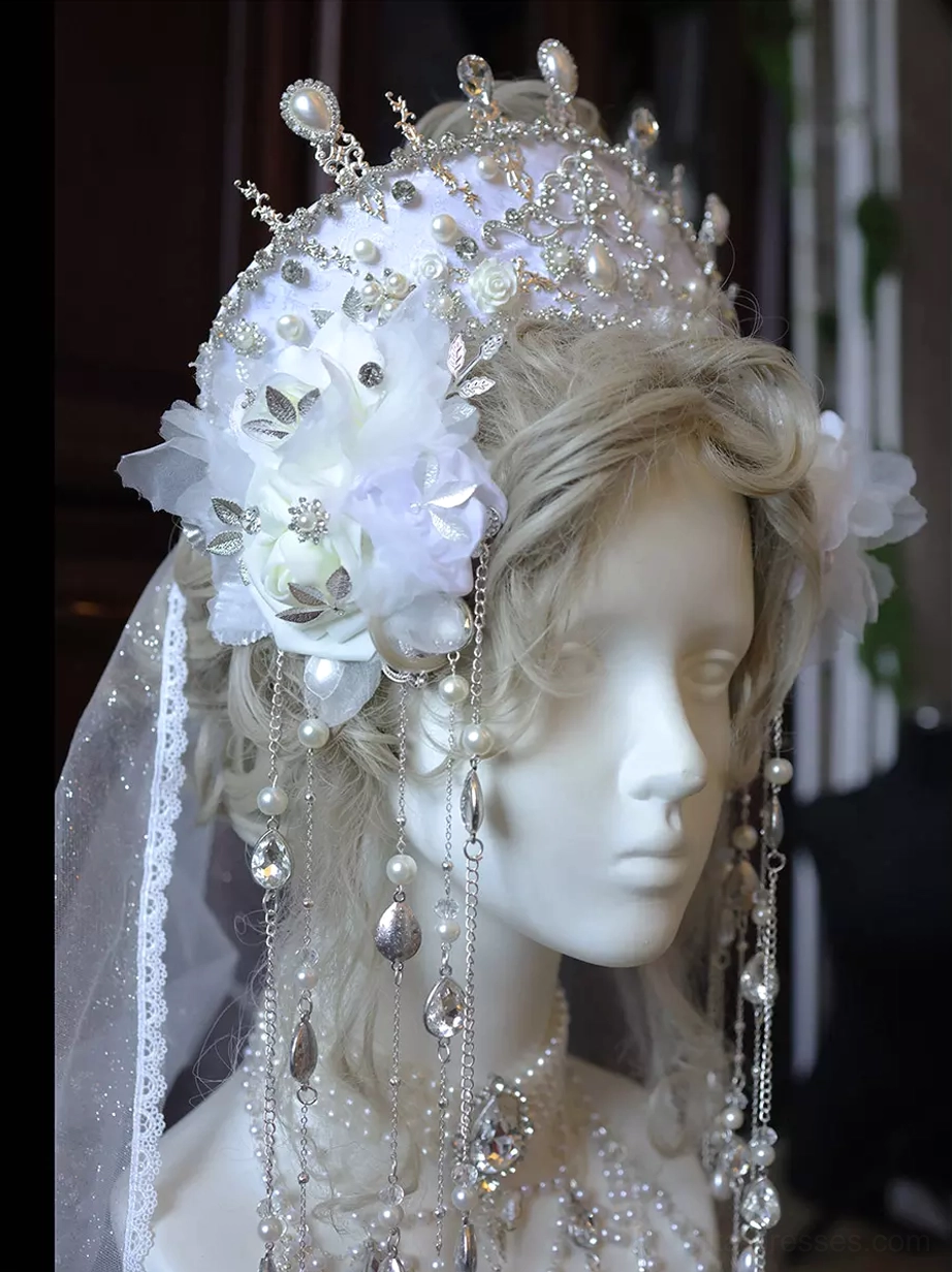 Romantic lolita floral crown headpiece right side view featuring white purple fabric flowers, long crystal drop chains, ethereal veil, and blonde curly hair styling