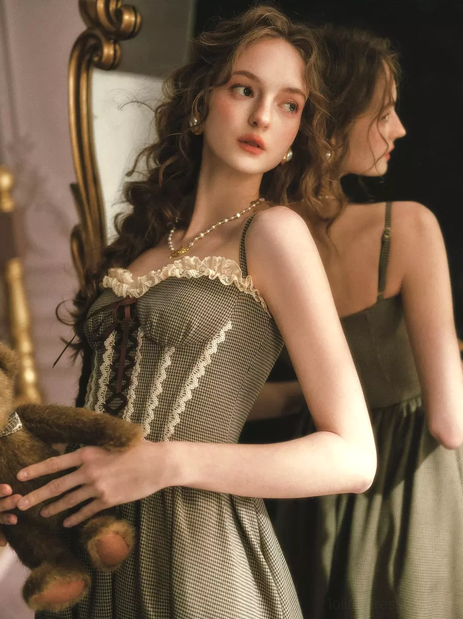 Close-up front and side view of sage green fairy corset dress showing lace trim bust detail front lace-up bodice and gingham fabric pattern with pearl necklace