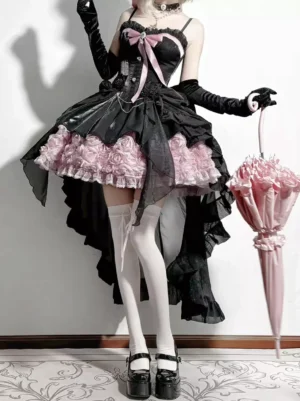 Fairy lolita corset gown half-body front view displaying spaghetti straps, fitted bodice, pink chest bow detail, and high-low tulle skirt with white thigh-high stockings and black gloves