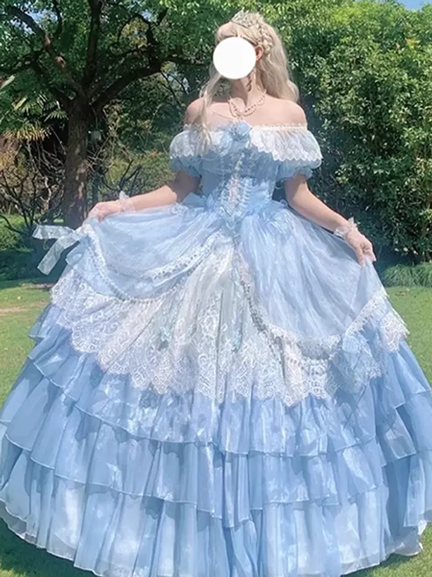 Sweet Lolita fairy dress three-quarter front angle showing detailed lace overlay, structured silhouette, and layered ruffle details with off-shoulder design