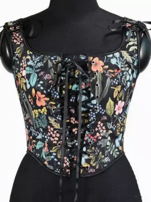 Front view of square neck floral camisole with lace-up corset closure and fabric-bound trim edges displayed on black mannequin