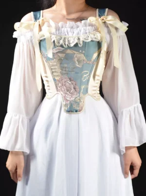 Vintage floral jacquard lolita corset bustier with bow shoulder straps and blue embroidery front view on model wearing white ruffled dress