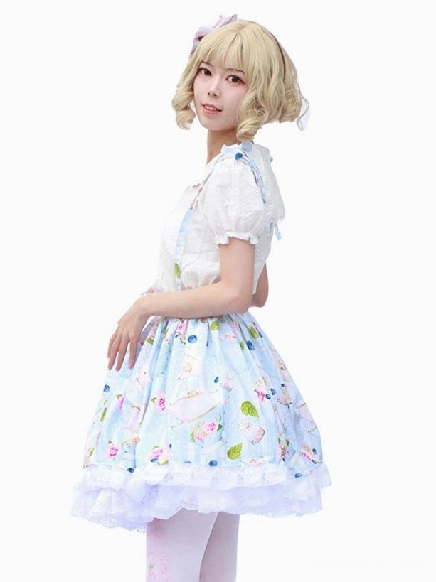 Floral printed lolita suspender skirt with slim silhouette ruffle trim right side view on white background blonde model