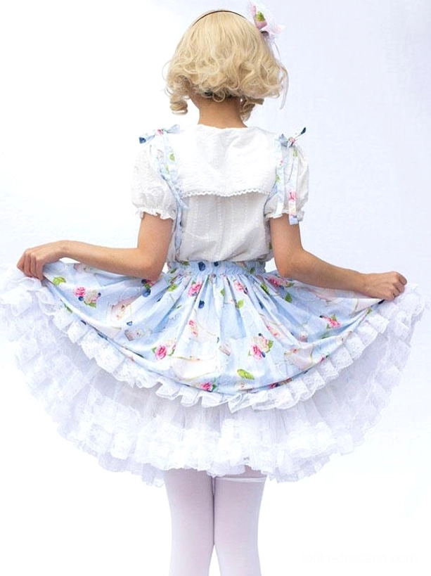 Lolita suspender skirt with all-over floral print white ruffle underskirt and matching top back full view on white background